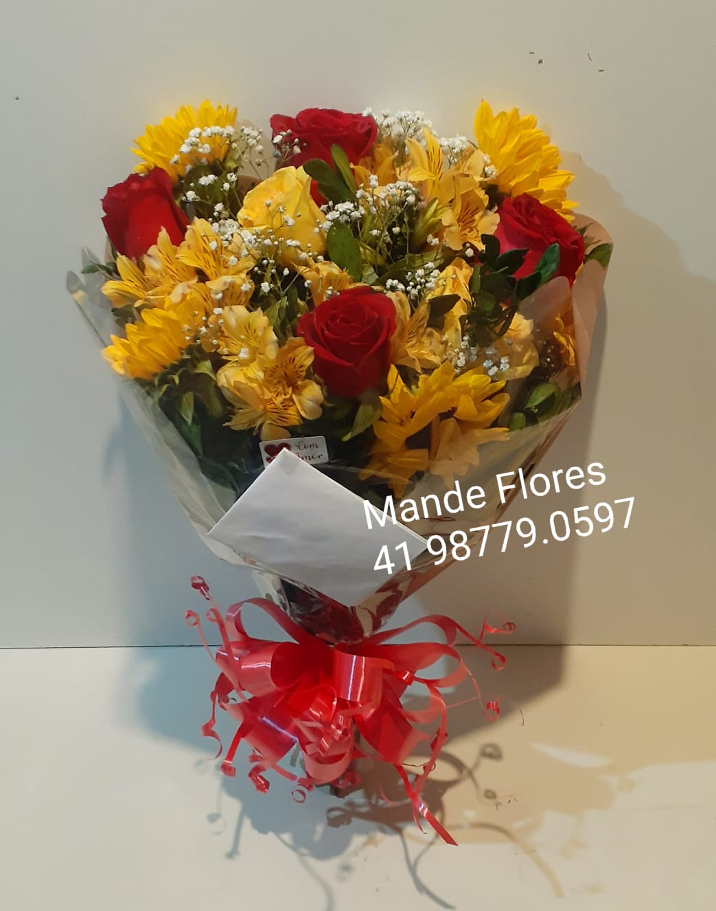 Girassóis com rosas